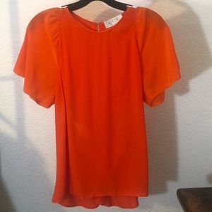 A.L.C. Crossed Back Flutter Sleeve Beautiful Orange Top. Size L. Never worn.